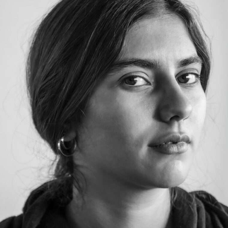 grayscale photo of woman in black shirt